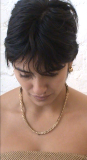 Model wears Laura Lombardi Greca Necklace